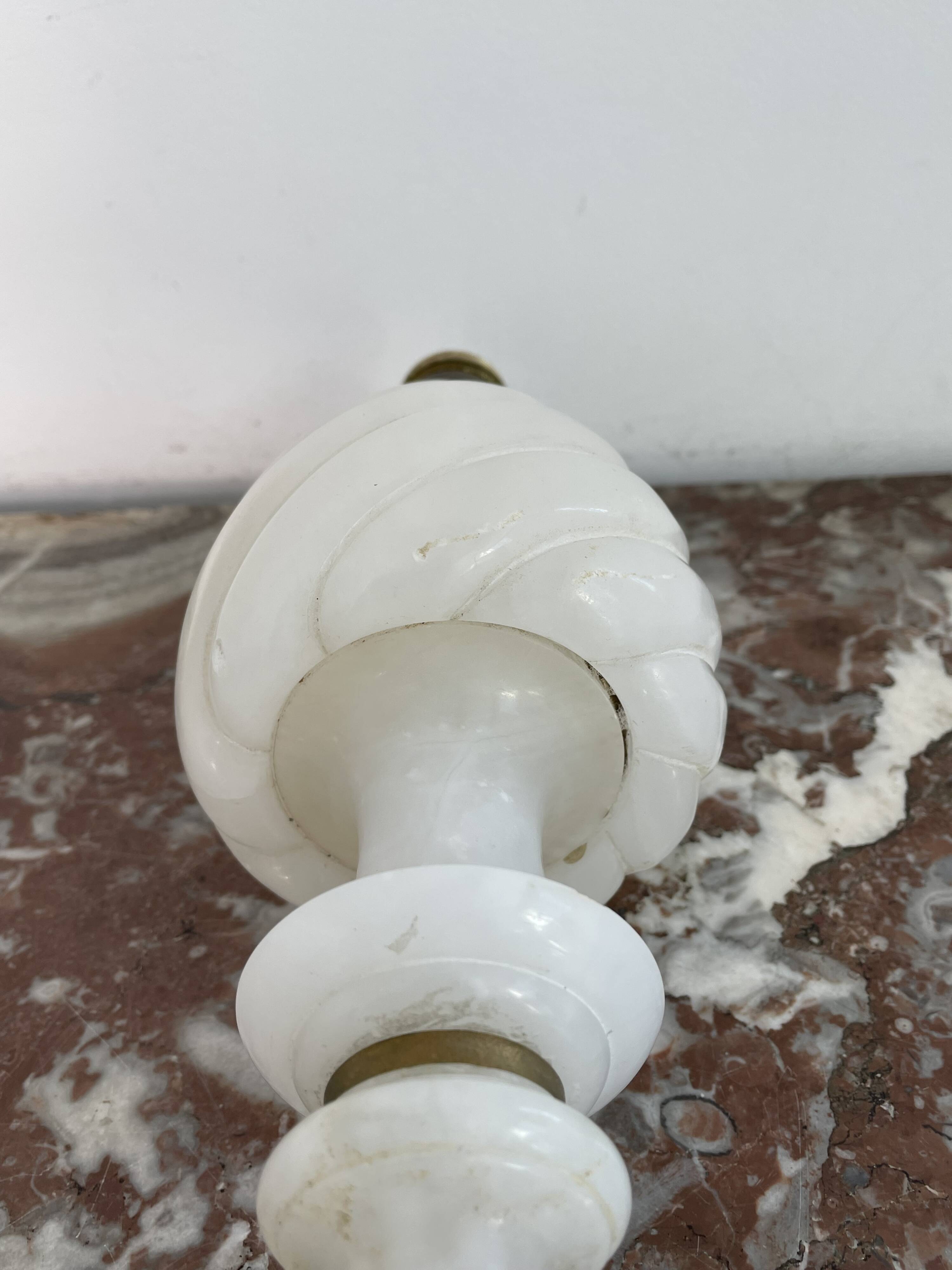 Alabaster lamp, twisted, gadroon decoration, gilded brass base, dolphins