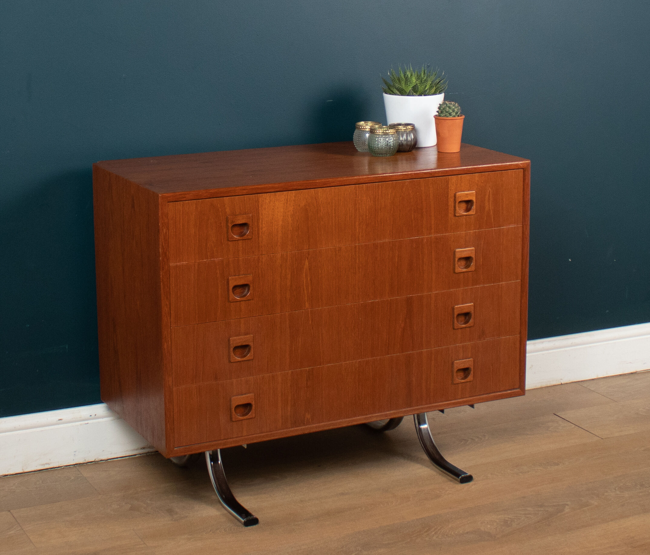 Retro teak 1960s danish chest of drawers on metal legs