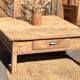 Large square farmhouse coffee table made of raw solid oak.