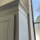 Blue patinated cap cabinet