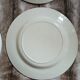 8 mismatched ironstone dinner plates