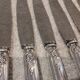 12 silver-plated dessert knives by St Medard, rocaille style, Florian.
