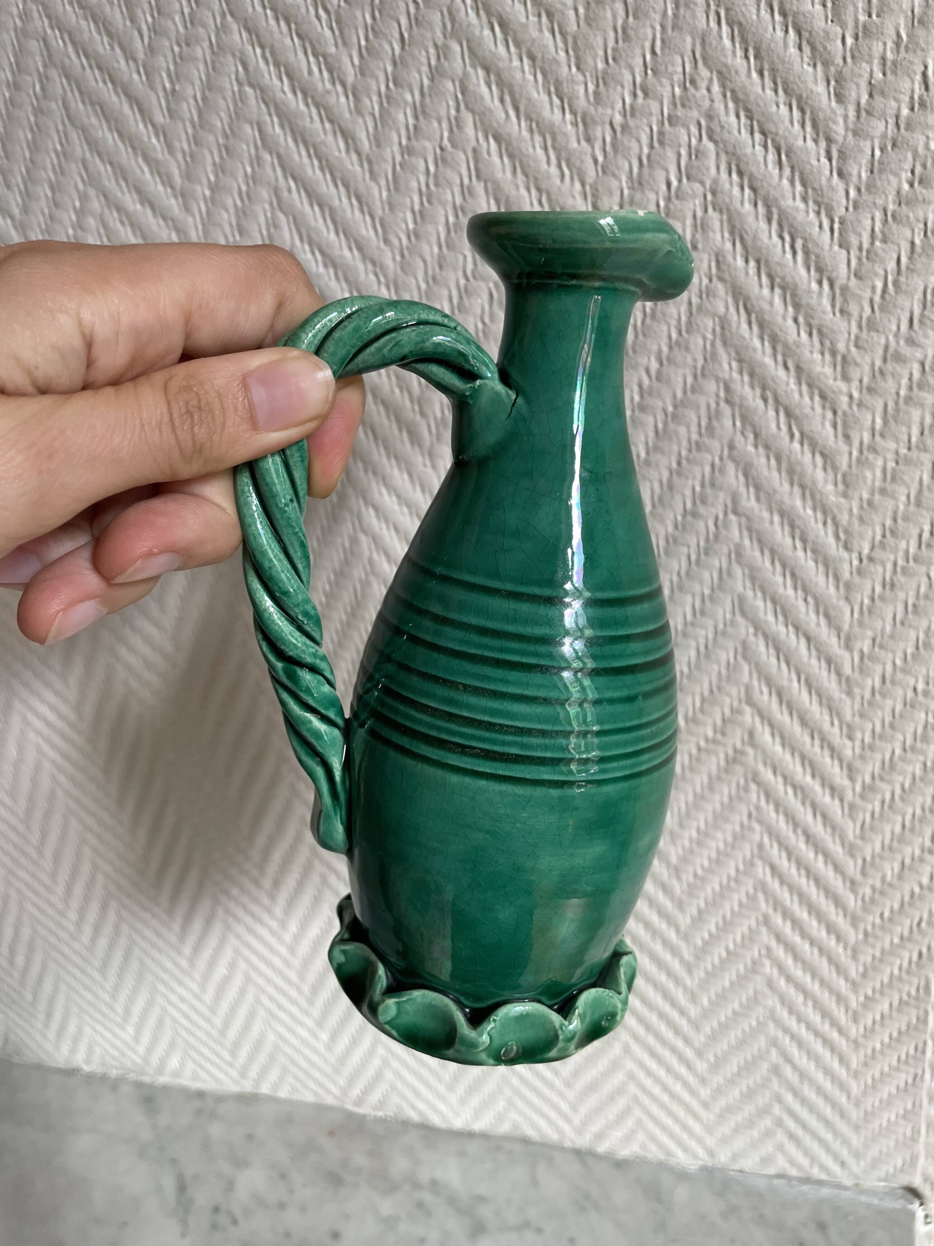 Small green ceramic pitcher