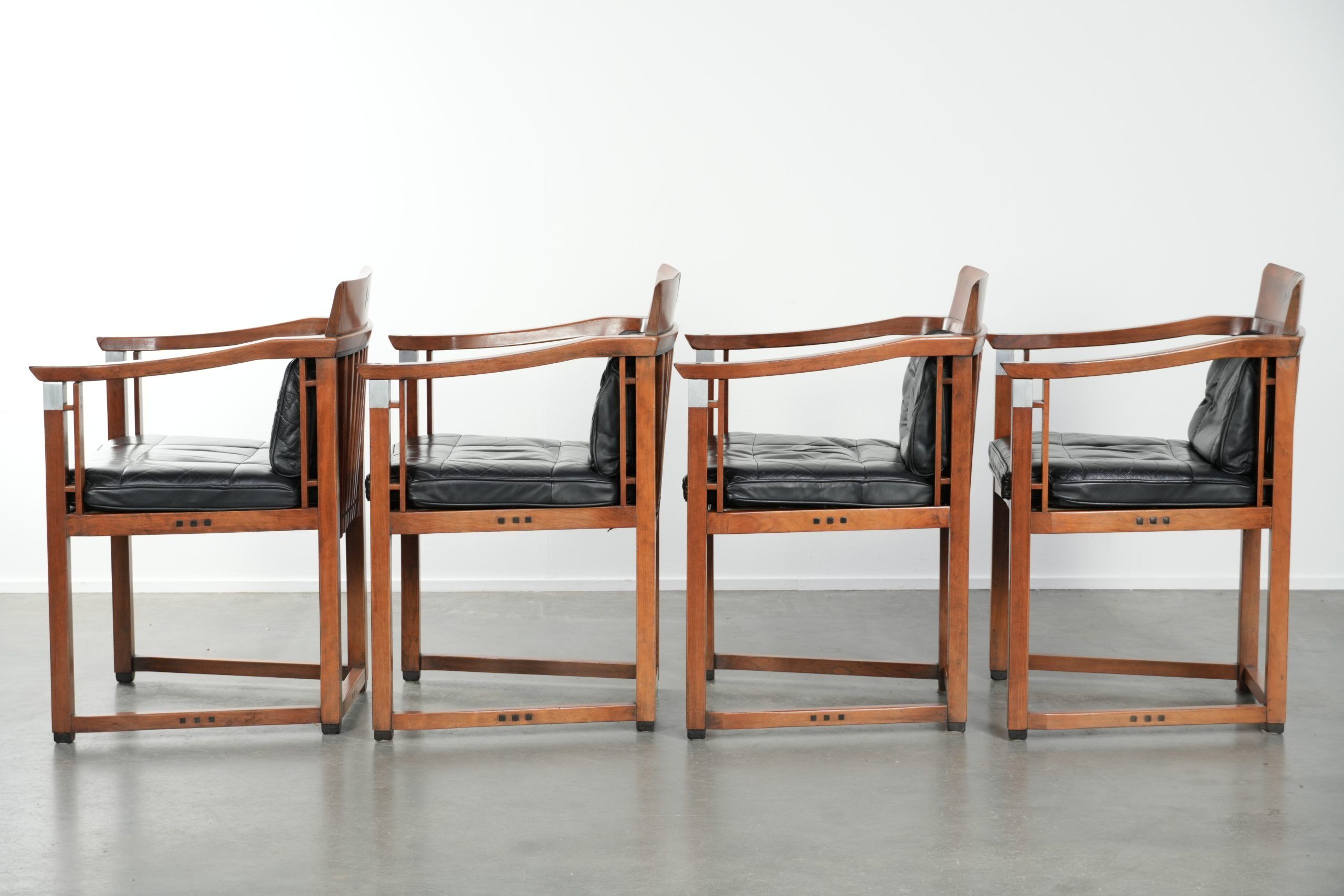 Black leather set of 4 Art Deco design dining chairs with armrests