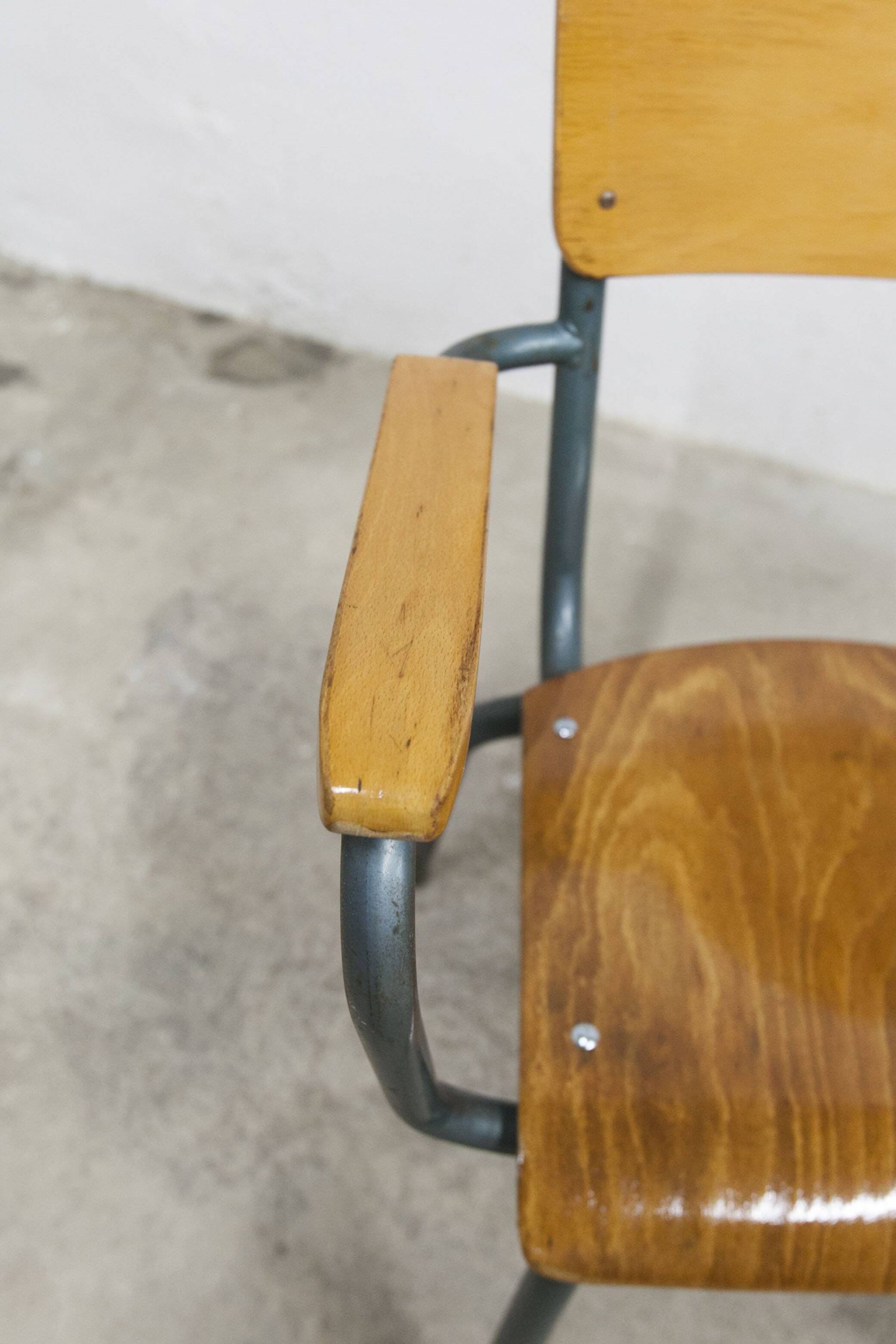 1962 school teacher's chair in honey color and tubular structure