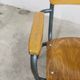 1962 school teacher's chair in honey color and tubular structure