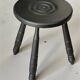 Set of side table and 2 stools, stained black wood, Circa 1950.