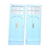 Double front door, fir and windows at the top