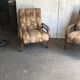 Pair of Art Deco armchairs from the 1930s in brown fabric and carved wood — vintage style