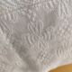 White woven cotton bedspread with fringes