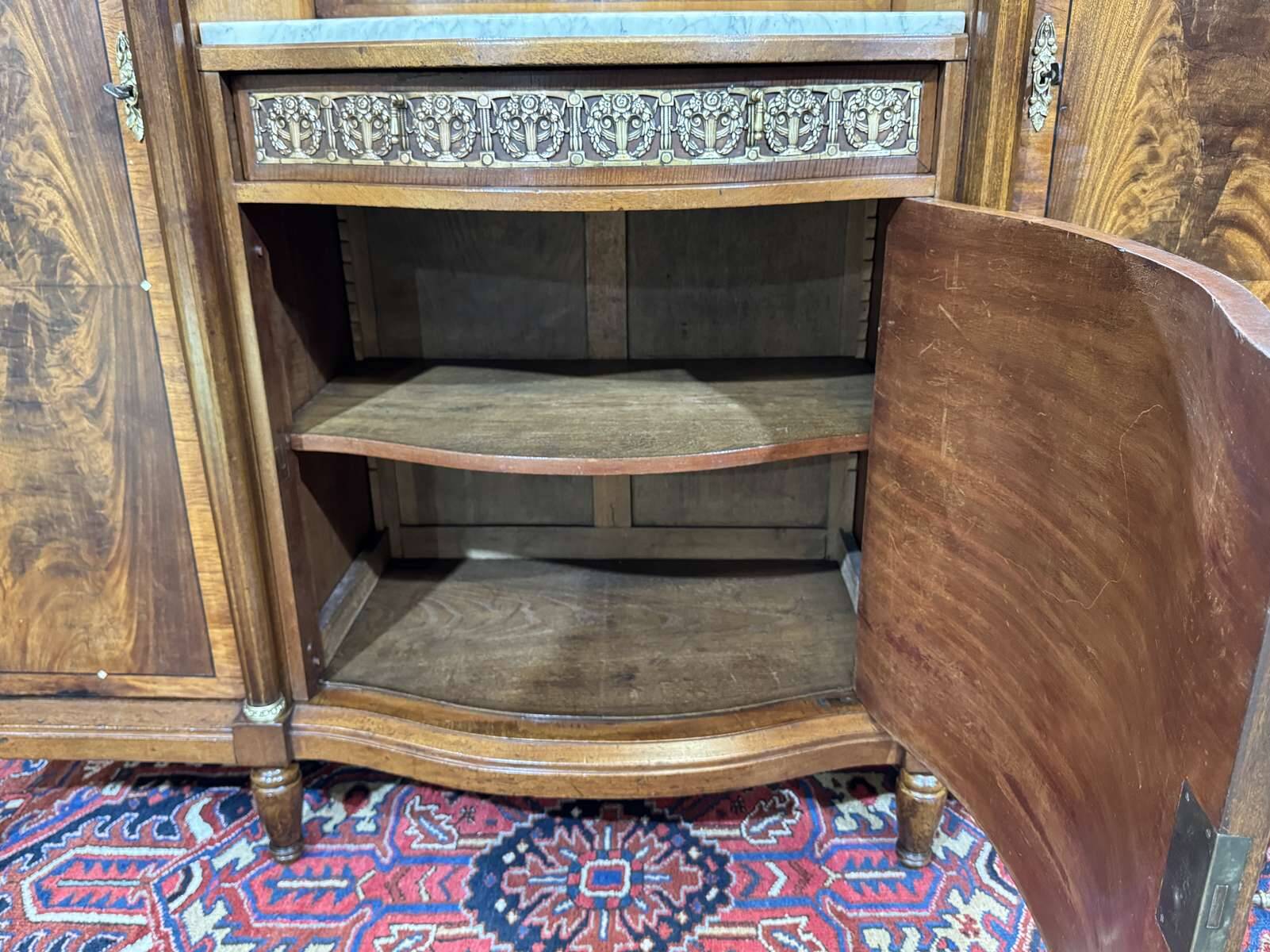 Art Deco buffet in mahogany, oak, and marble top.