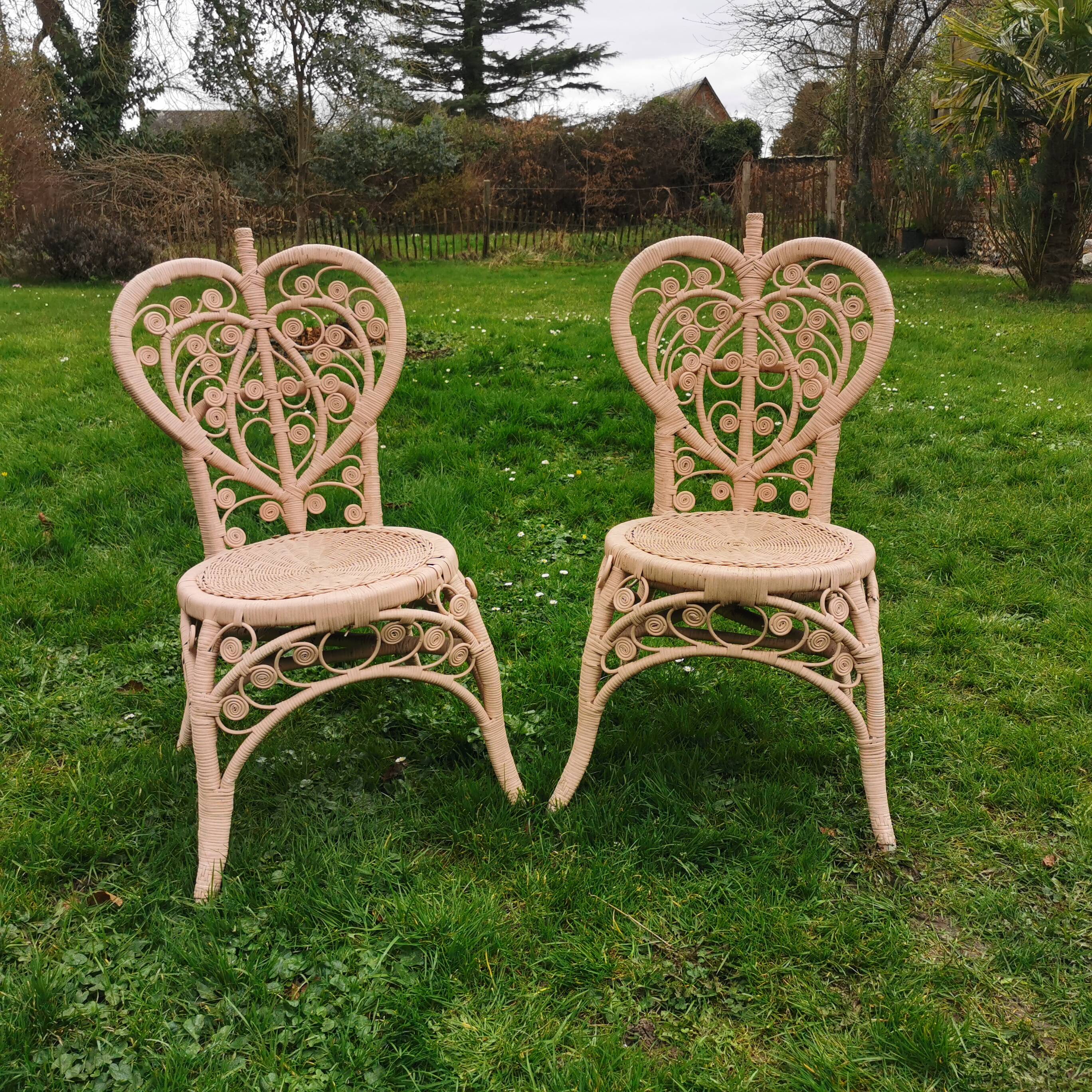 Pair of Peacock rattan chairs