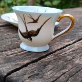 Cup and its saucer in Limoges porcelain motif "swallows"