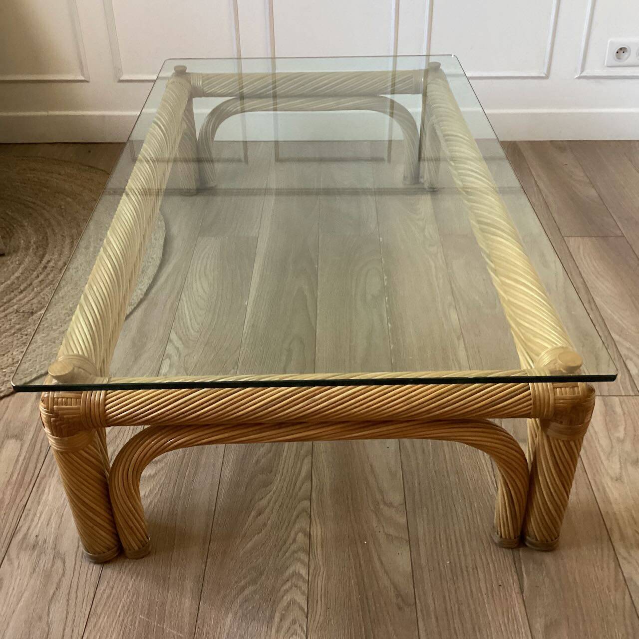 Large rattan and glass coffee table