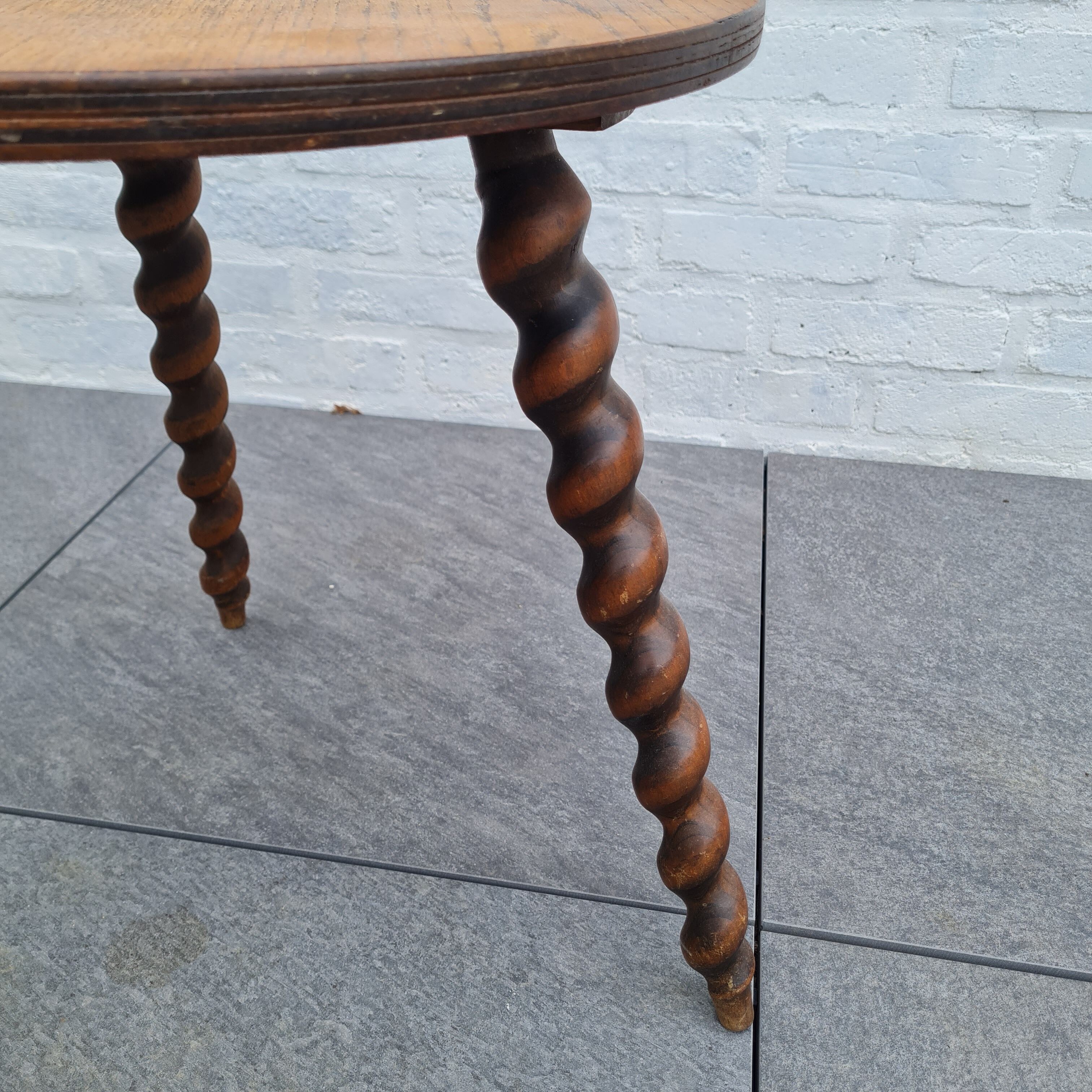 Wooden coffee table twisted tripod base