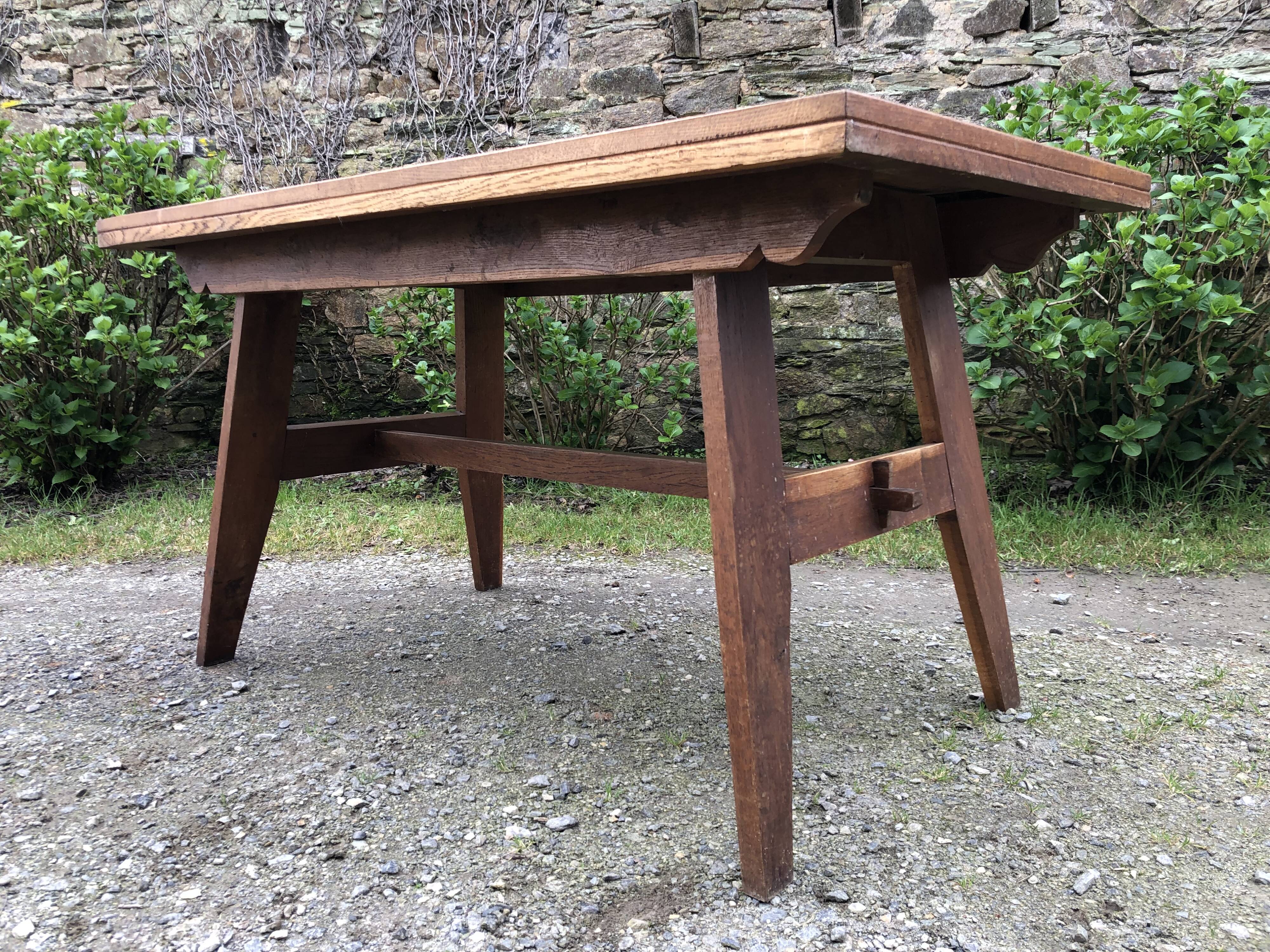 Vintage René Gabriel oak table from the reconstruction period.