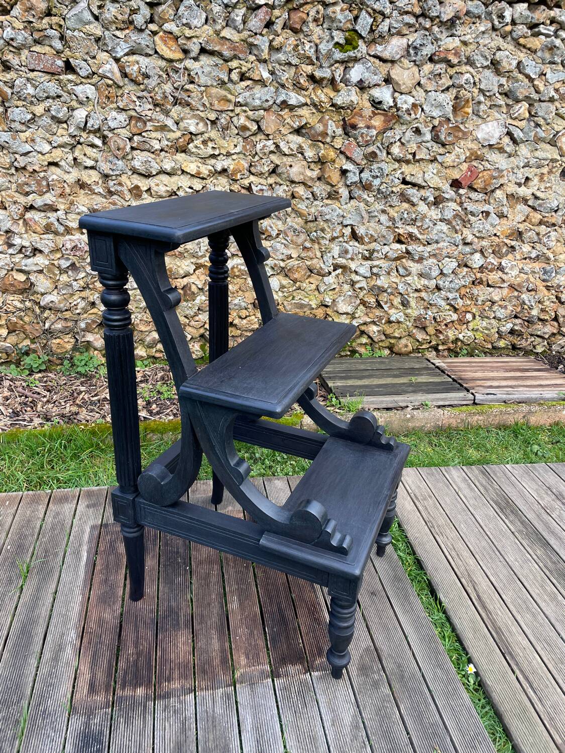 Old library stepladder in blackened wood