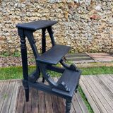 Old library stepladder in blackened wood