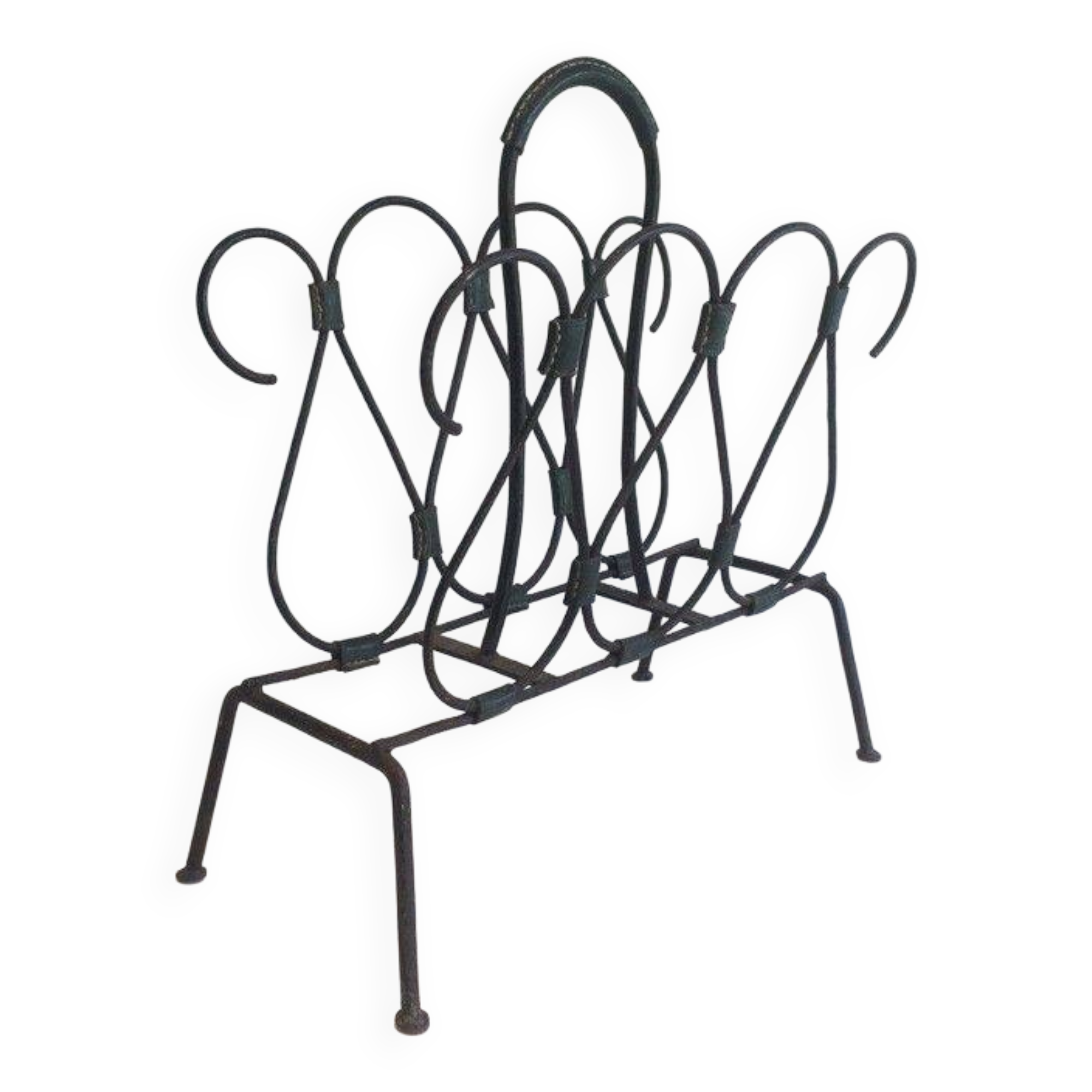 Magazine rack in leather and black lacquered metal. Attributed to Jacques Adnet