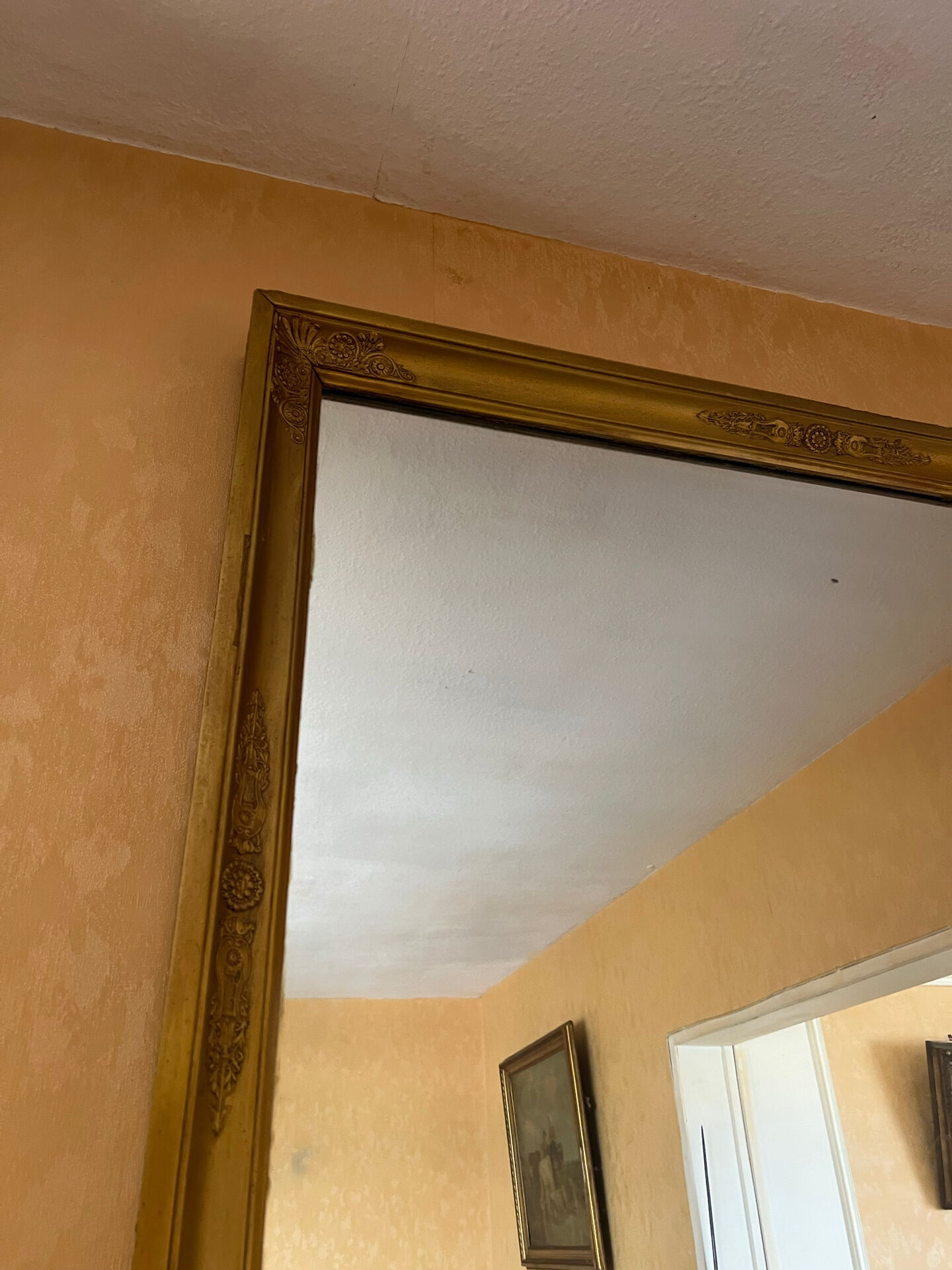Large antique mirror in the Napoléon III style.