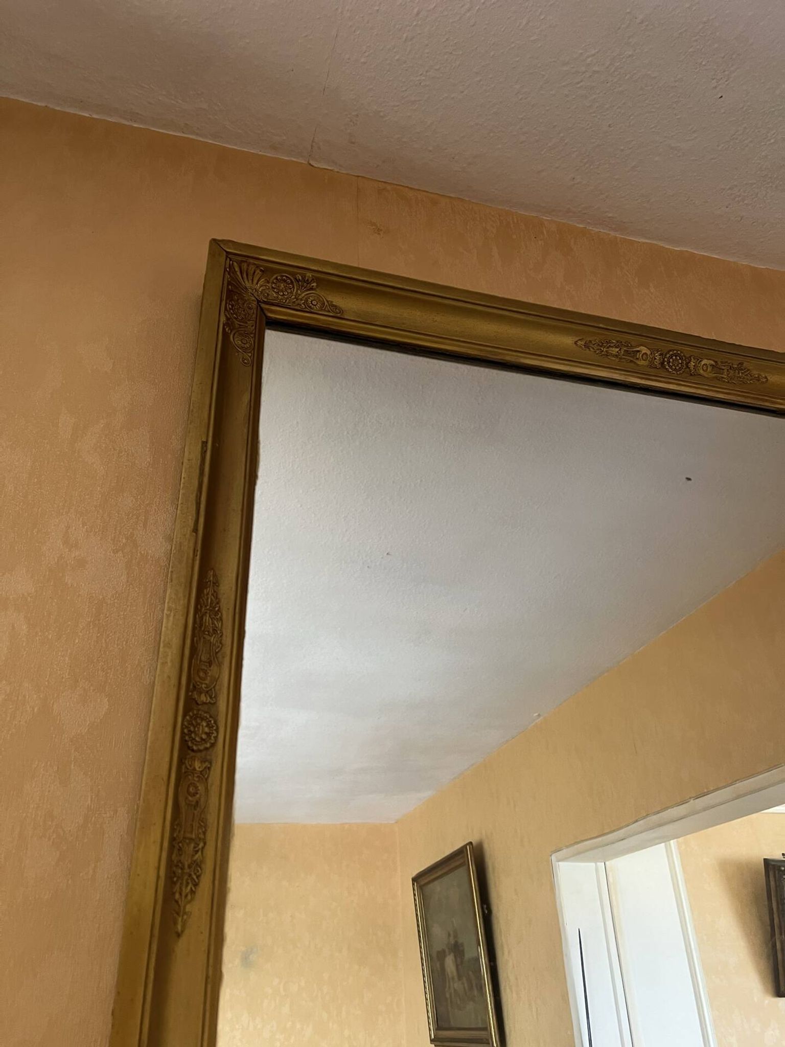 Large antique mirror in the Napoléon III style.