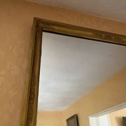 Large antique mirror in the Napoléon III style.
