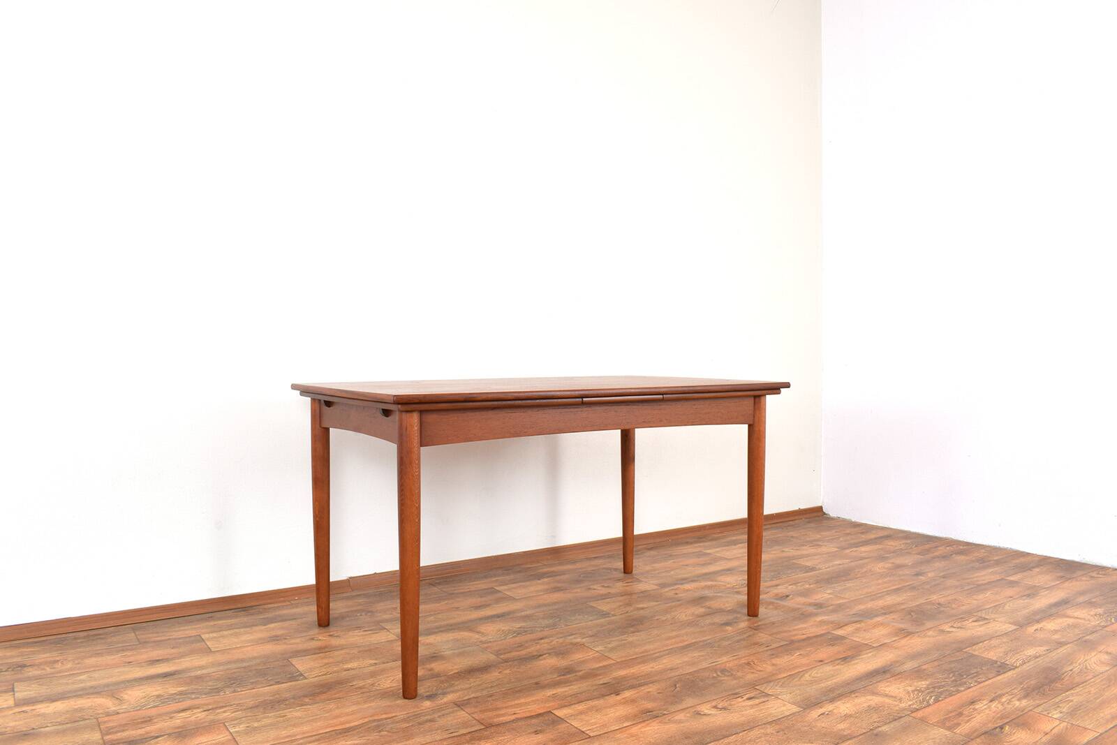 Mid-century Danish teak extendable dining table, 1960s.