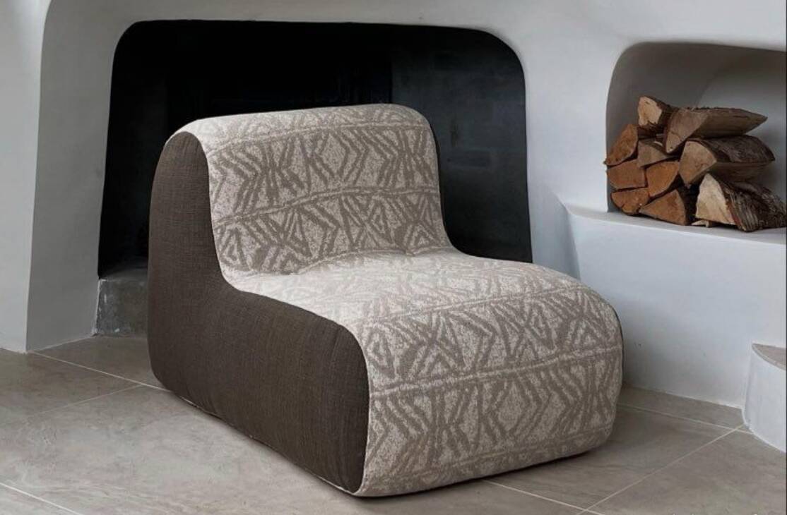 Pair of reupholstered vintage armchairs