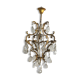 Old chandelier has tassels
