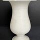 Alabaster vase on pedestal