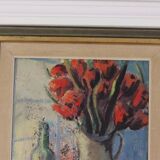 Bouquet rouge et bouteille de vin