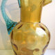 Pichet pot à eau George Sand art nouveau, verre ambre et anse bleue