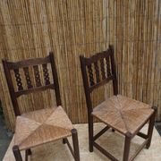 Pair of antique straw-seated farm chairs