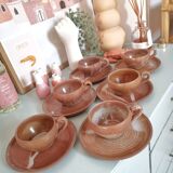 Set of vintage stoneware cups and saucers