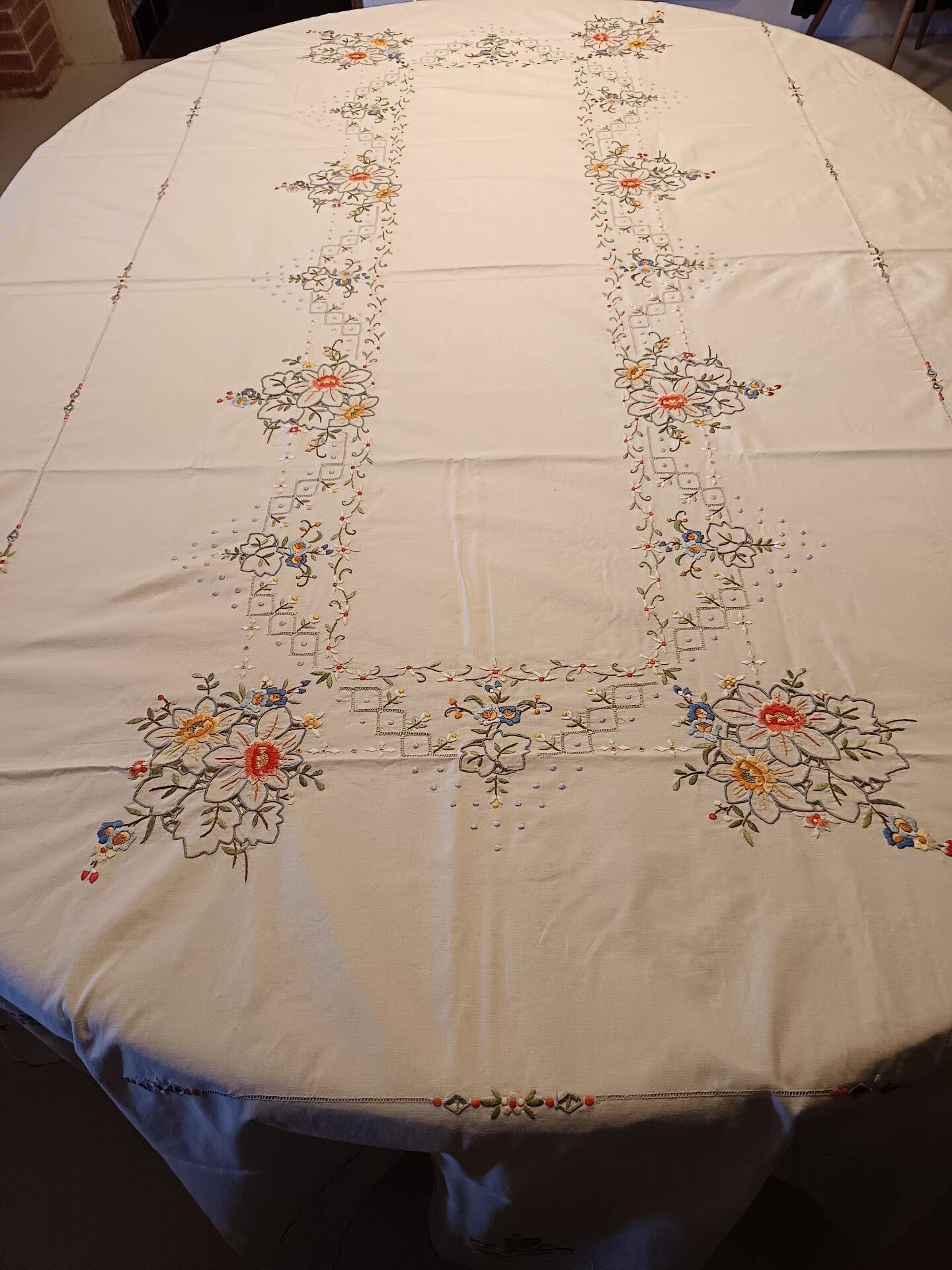 Large old embroidered and openwork tablecloth and 8 napkins.