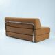 Bauhaus style tubular sleeping sofa in yellow ocre wool