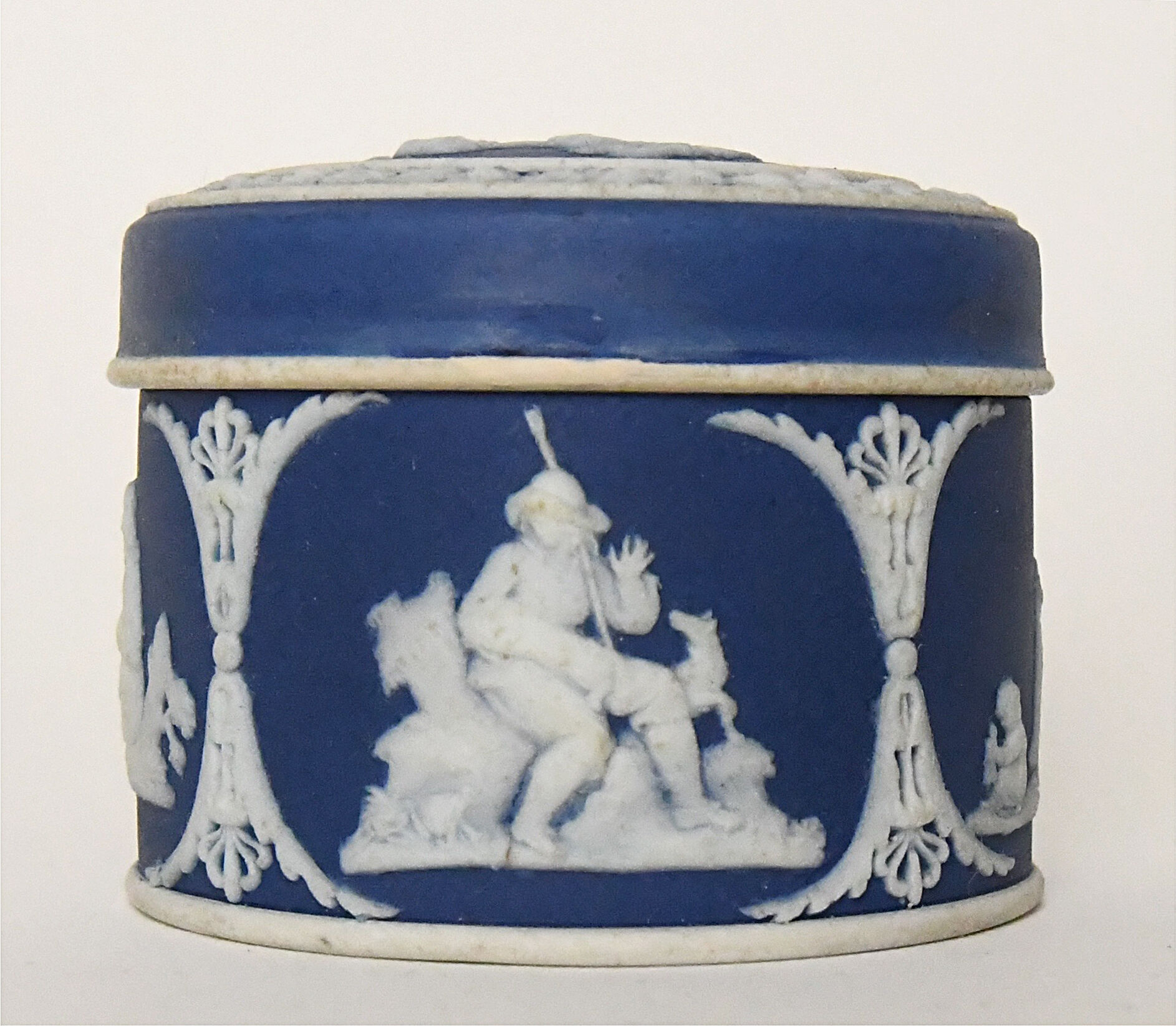 Pair of Wedgwood biscuit boxes with relief decoration of antique scenes