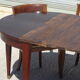 Half-moon console table, extendable in Empire style.