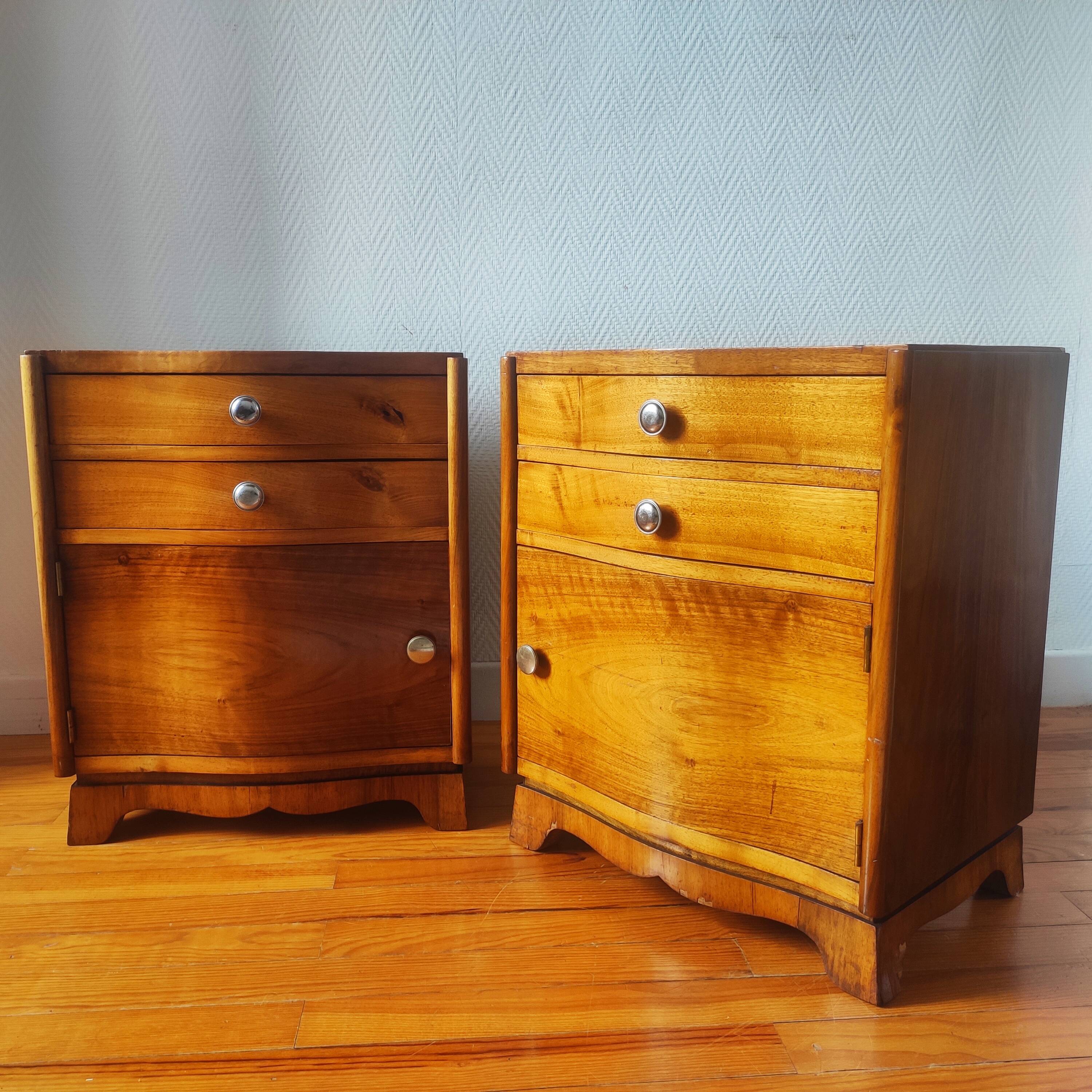 Pair of Art Deco curved bedside tables in light wood.