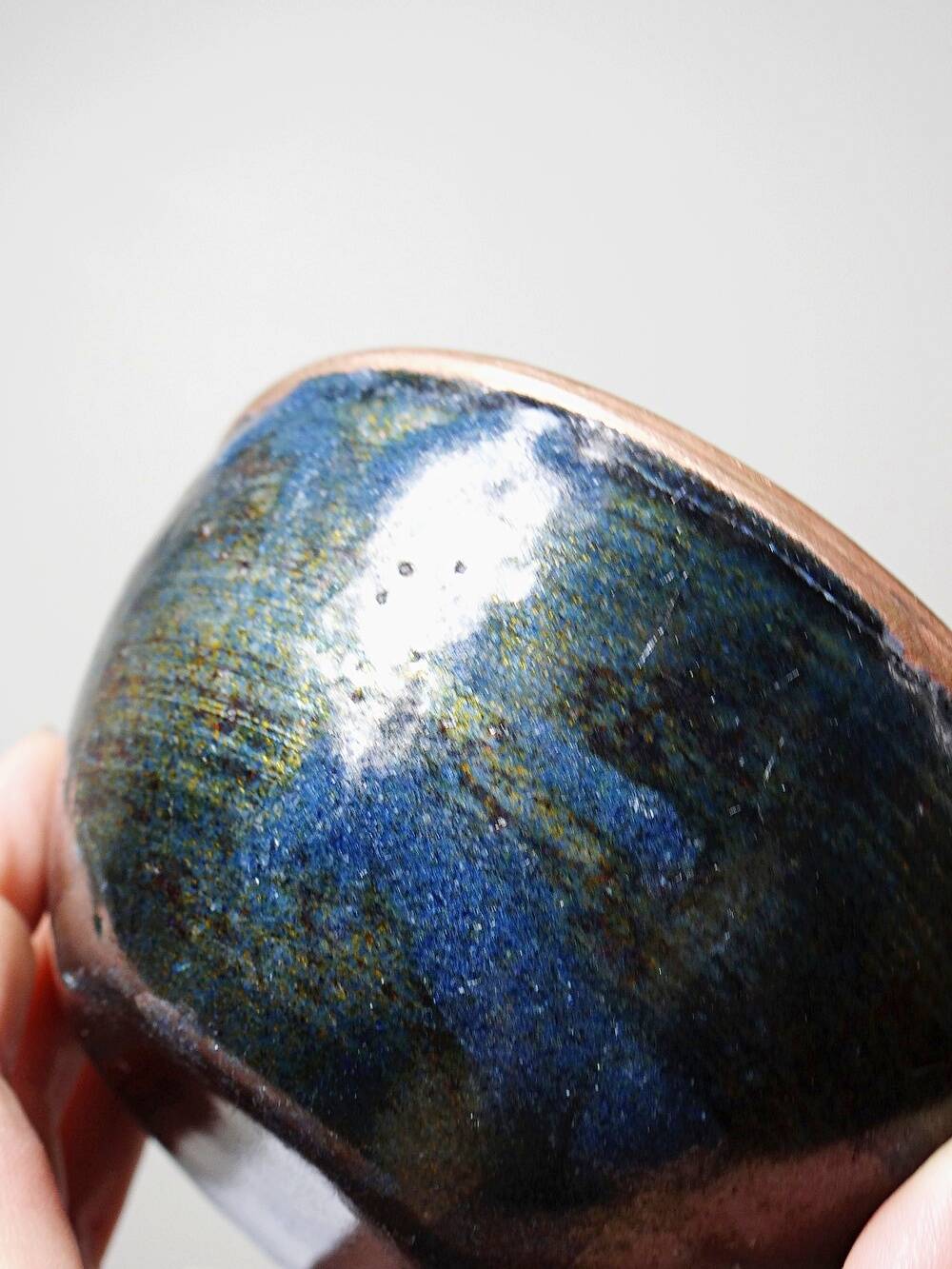 Pair of vintage hand-crafted blue and copper enamelled bowls.