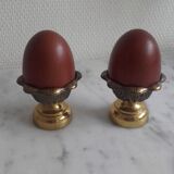 Pair of brass cockroaches with wooden eggs