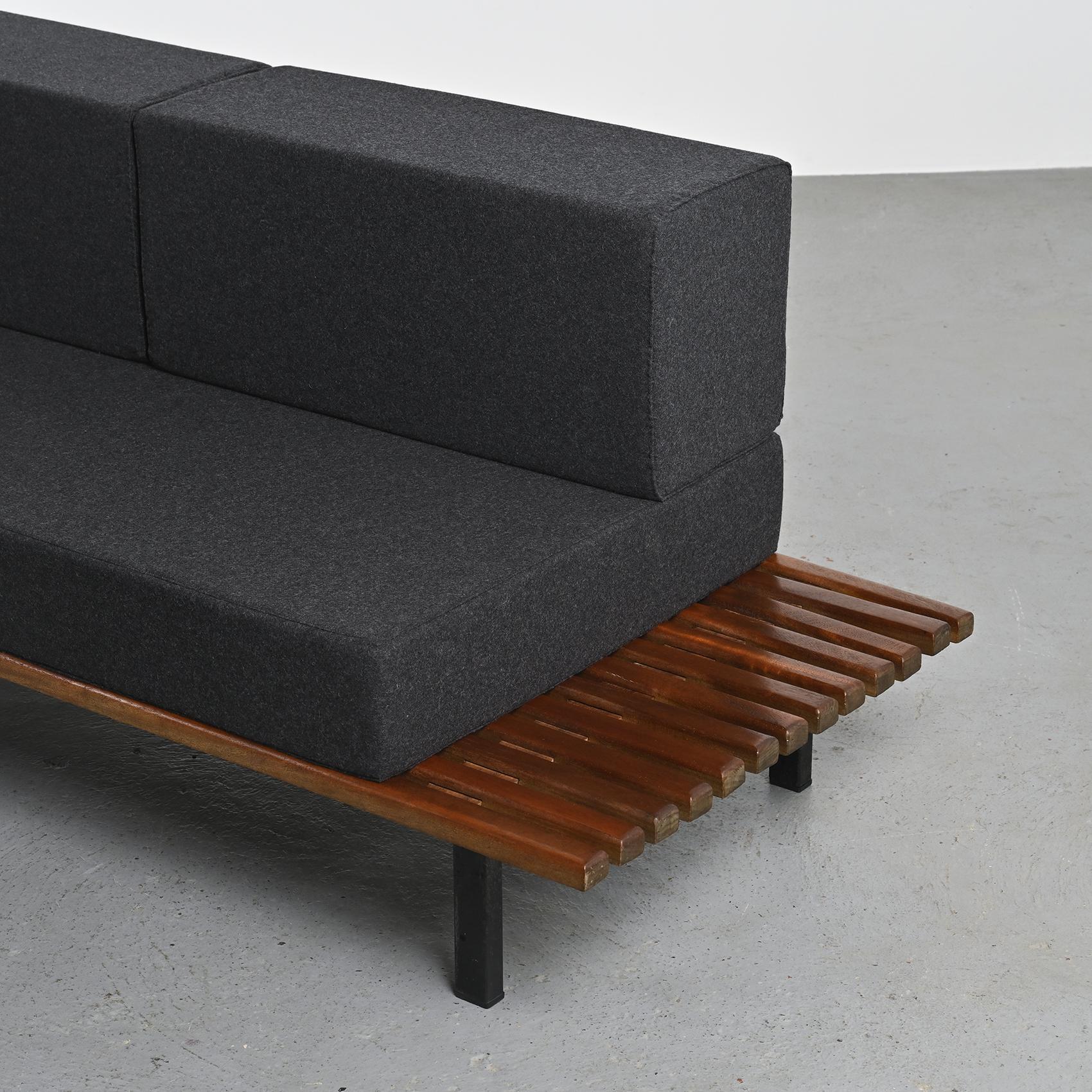 Cansado mahogany bench by Charlotte Perriand, circa 1962.