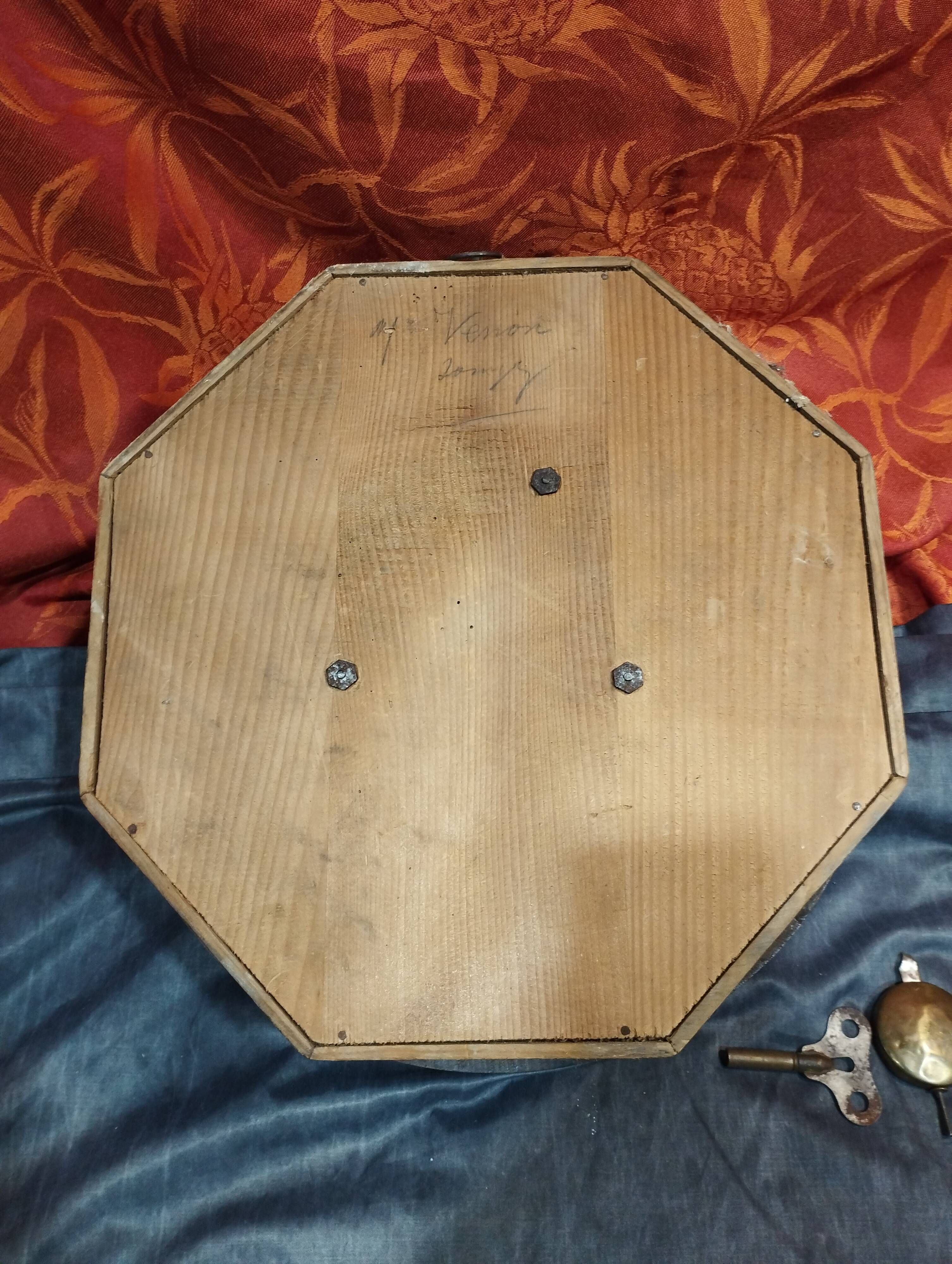 Old round porthole bull's eye wall clock in its wooden case + pendulum + key