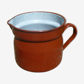 Old enameled steel pitcher