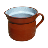Old enameled steel pitcher