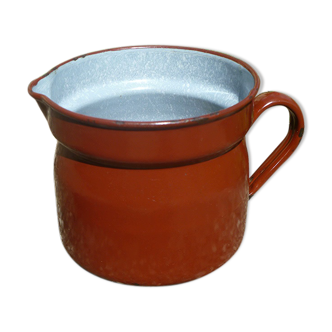 Old enamelled steel pitcher