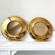 Round mirrors strapping in vintage gilded brass