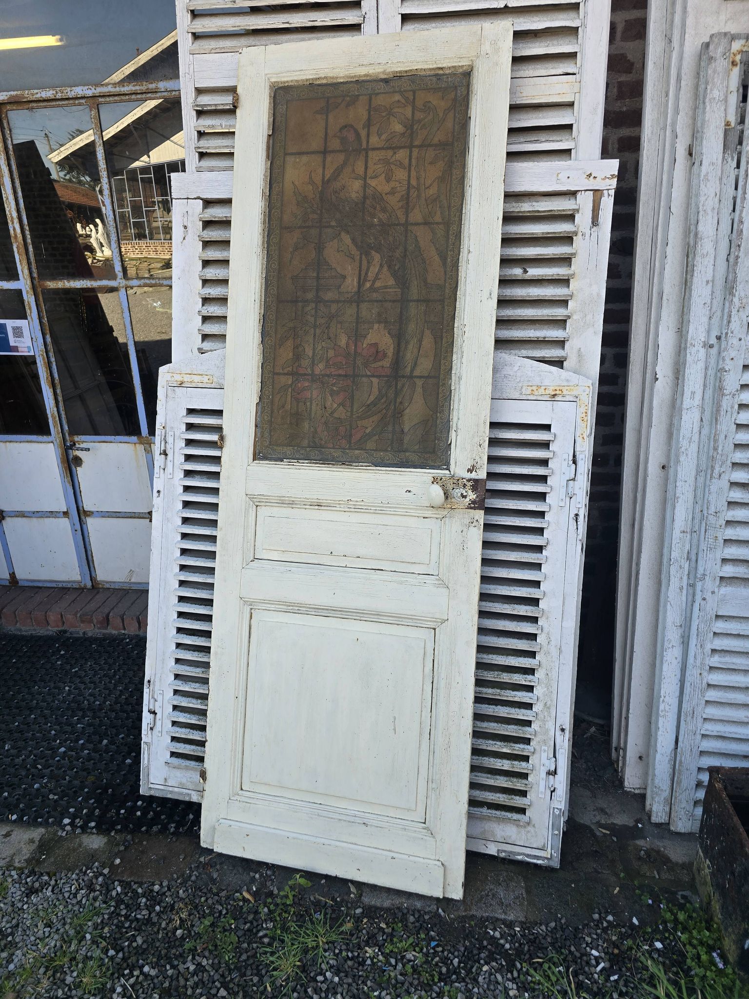 old door with decorated window