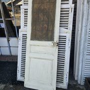 old door with decorated window
