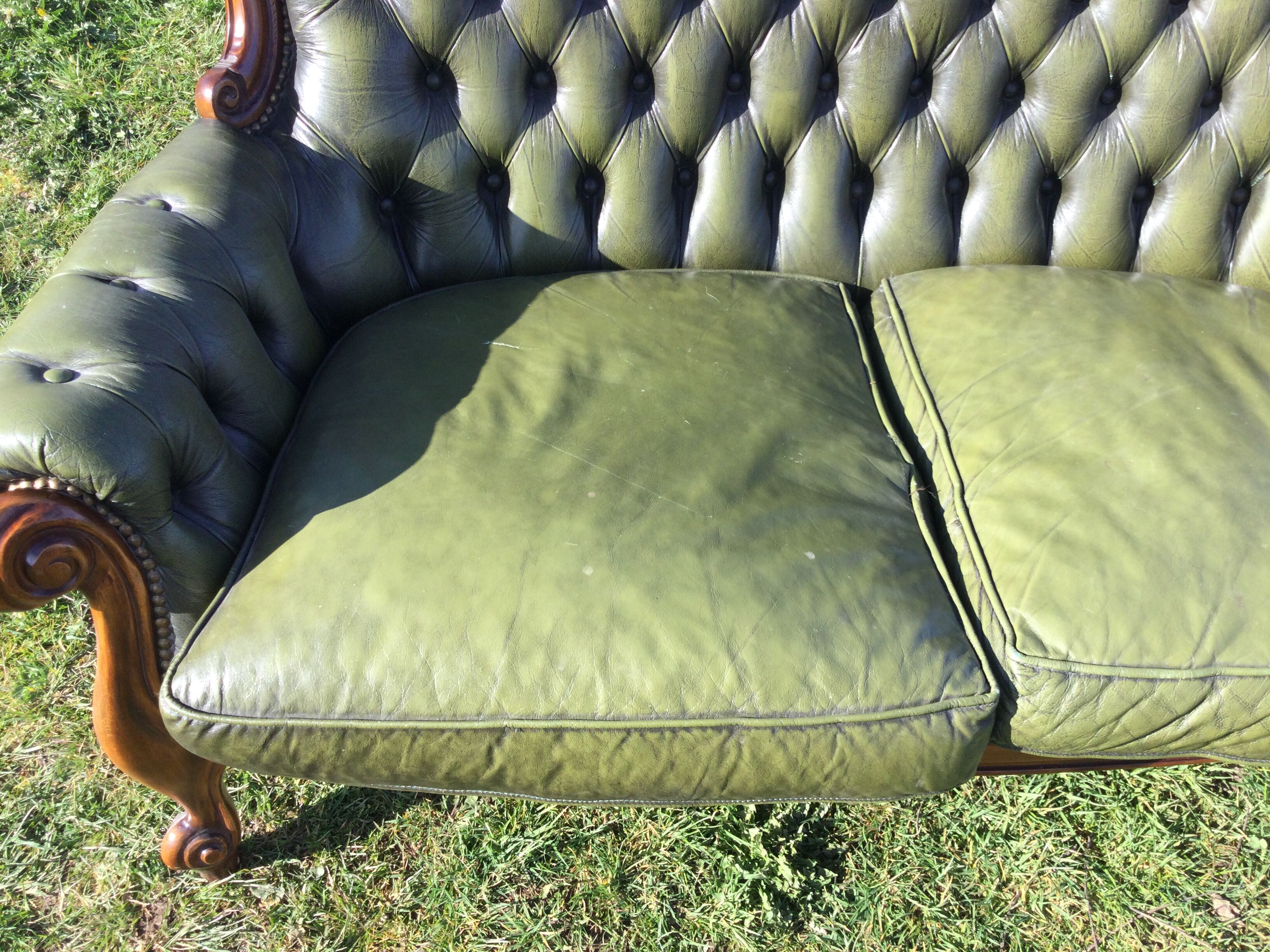 Wooden and leather chesterfield sofa